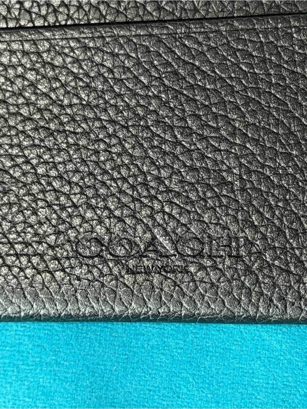 Coach sleek black